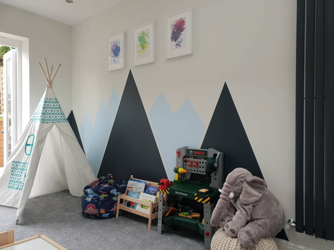 kids game room teepee mountain walls gray carpet toy elephant and tool set
